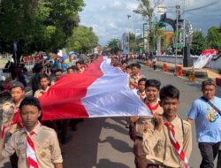 Haul Kiai Surgi, 1.378 Pasukan Kirab Bentangkan Bendera Merah Putih Sepanjang 250 Meter