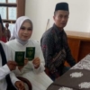 Sempat Didemo dan Balai Desa Disegel, Kades Sengon Resmi Menikah di KUA Tanjung